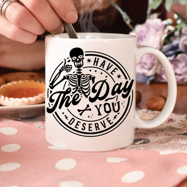 Skeleton "Have the Day You Deserve" Mug. Premium quality mug design, perfect gift.
