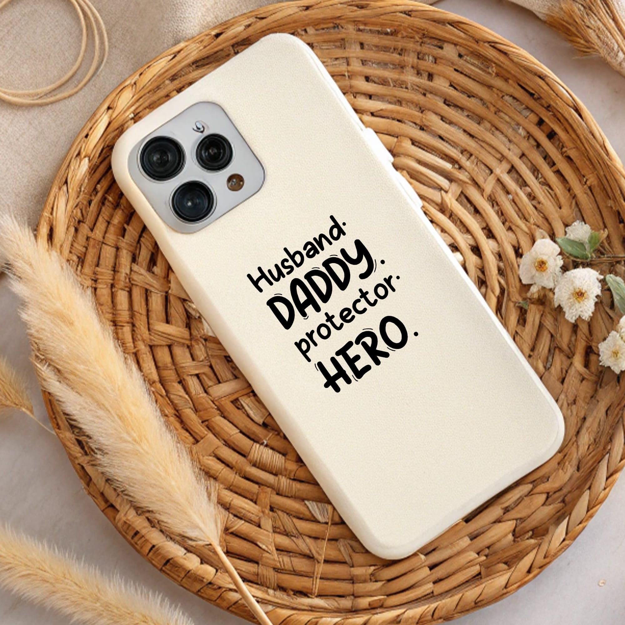 Cream phone case with "Husband, Daddy, Protector, Hero" design. Perfect for laser cutting, Cricut, Silhouette, and screen printing.