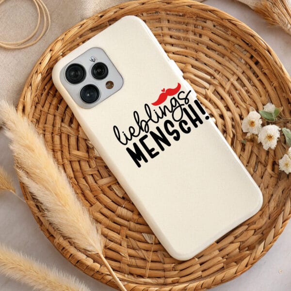 Cream phone case with red mustache and "Lieblings Mensch" text. Perfect Valentine's Day gift! DTF & sublimation PNG.