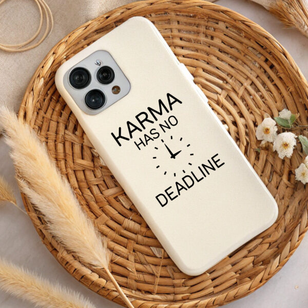 Cream phone case with "Karma has no deadline" design. Perfect gift.