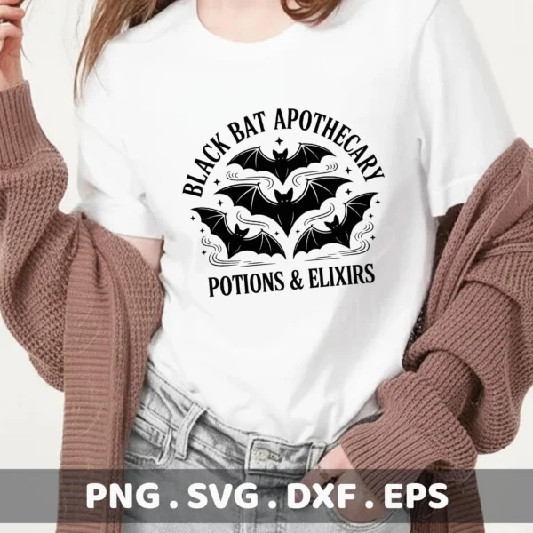 A woman models a white t-shirt featuring a black "Bat Apothecary" Cricut Design, ideal for Halloween-themed cutting projects and serigraphy applications.