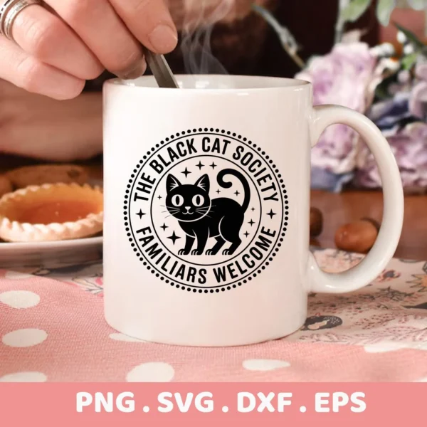 Close-up of a white mug featuring a "Black Cat Society" design, intended for Cricut cutting and serigraphy applications.