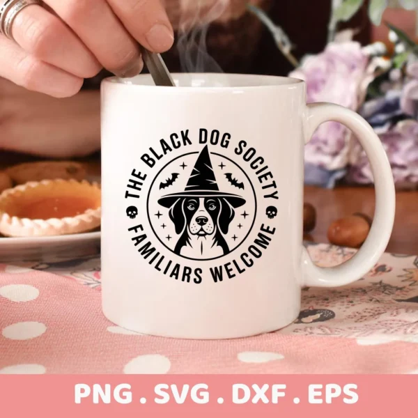Halloween Dog Cricut Design: A white mug features a black vector graphic of a dog wearing a witch's hat, surrounded by bats, stars, and skulls, intended for cutting or serigraphy applications.