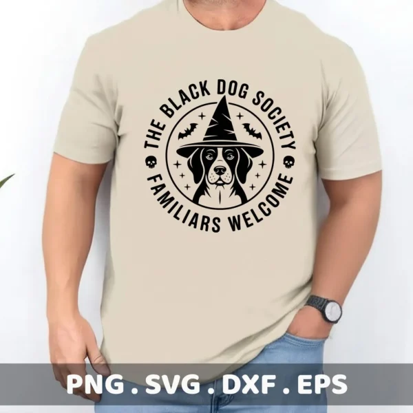 A tan t-shirt displays a black Halloween Dog Cricut Design featuring a dog wearing a witch hat, encircled by "The Black Dog Society, Familiars Welcome," suitable for cutting or serigraphy.