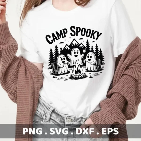 A white t-shirt displays a "Camp Spooky" design featuring cartoon ghosts camping around a campfire, intended for Cricut cutting or serigraphy applications.