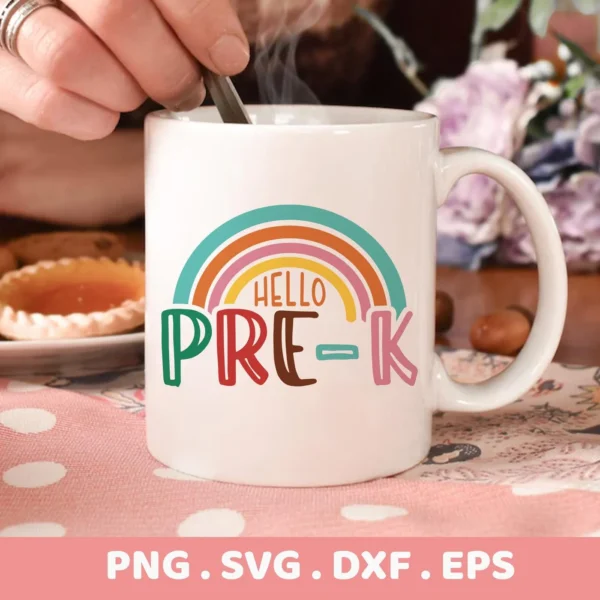 Hello Pre-K SVG" rainbow design shown as a vinyl decal on a coffee mug for Cricut cutting.