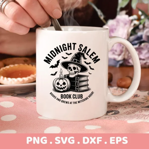 Close-up of a white mug featuring a Halloween Book Club Cricut design with a skull wearing a witch hat, stacked books, a jack-o'-lantern, and bats, intended for cutting or serigraphy applications.