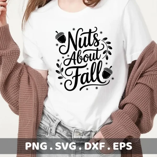 A woman wears a white t-shirt with a black "Nuts About Fall" design featuring acorns and decorative flourishes, intended for Cricut cutting and shirt serigraphy.