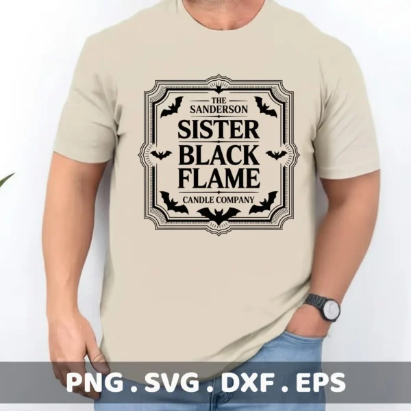 A man wears a t-shirt featuring a Sanderson Sister Cricut Design, a black, ornate label with bats and the text "The Sanderson Sister Black Flame Candle Company," suggesting a Halloween or witch-themed cutting project for apparel or candle labels.