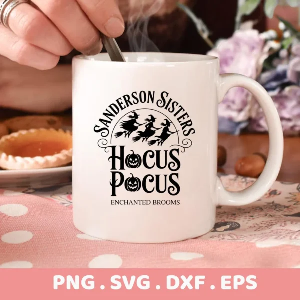 Close-up of a white mug featuring a "Sanderson Sisters Hocus Pocus" design, showcasing a Halloween-themed Cricut cut file for cutting and serigraphy applications.