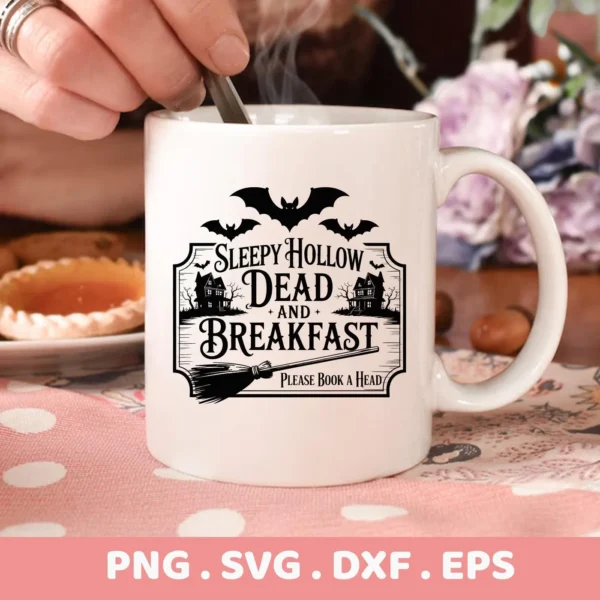 Close-up of a white mug featuring a "Sleepy Hollow Dead and Breakfast" design with bats, haunted houses, and a broom, intended as a Dead Breakfast Cricut Design for cutting or serigraphy applications.