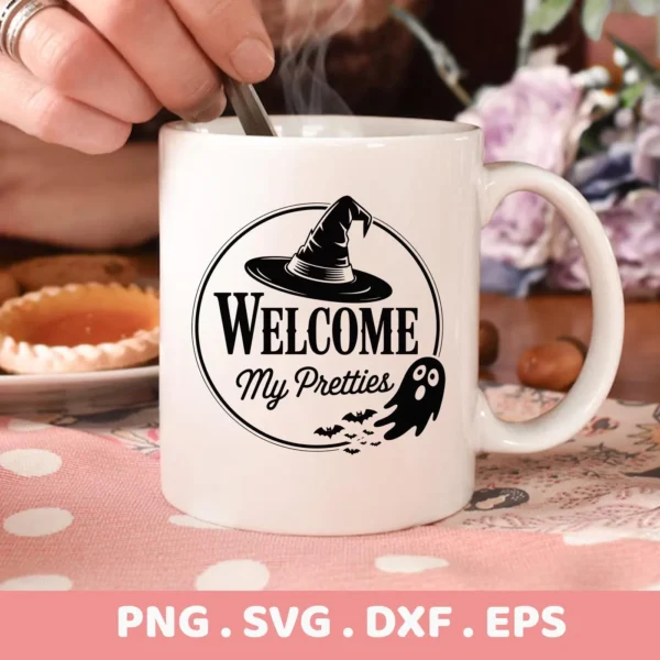 Close-up of a mug featuring a "Halloween Welcome Cricut Design" with a witch hat, bats, and ghost, ideal for cutting and serigraphy projects.