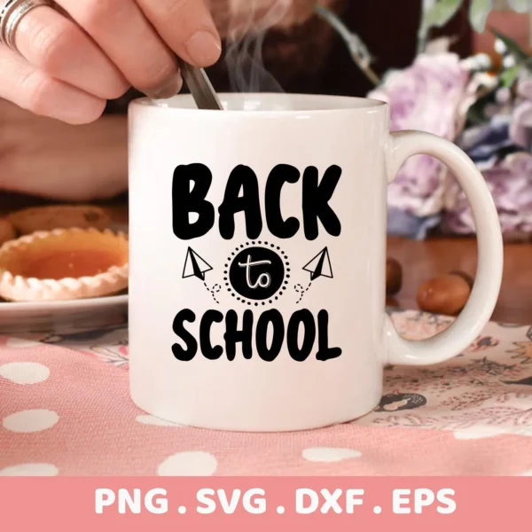 A white mug with a "Back to School" SVG design featuring paper airplanes, part of a digital download bundle (SVG, PNG).