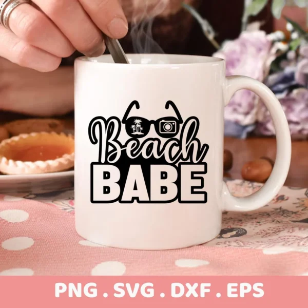 Close-up of a white mug featuring a "Beach Babe" SVG design with sunglasses, palm trees, and a camera graphic, indicating a digital download bundle (SVG, PNG).