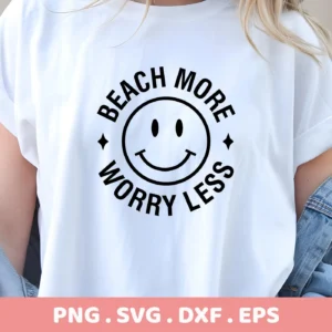 A white t-shirt displays a black circular design with a smiley face in the center, surrounded by the text "Beach More Worry Less," available as a "Beach More Worry Less SVG" digital download bundle (SVG, PNG, DXF, EPS).