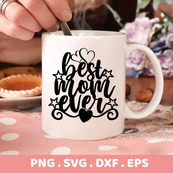 Close-up of a white mug with the text "Best Mom Ever" in a decorative font, indicating a "Best Mom Ever SVG" digital download bundle (SVG, PNG).