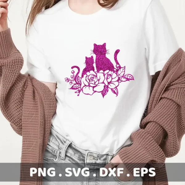A white t-shirt displays a glittery pink "Cats Roses Silhouette SVG" design featuring two cats sitting atop a bouquet of roses; this is a digital download bundle including SVG and PNG files.