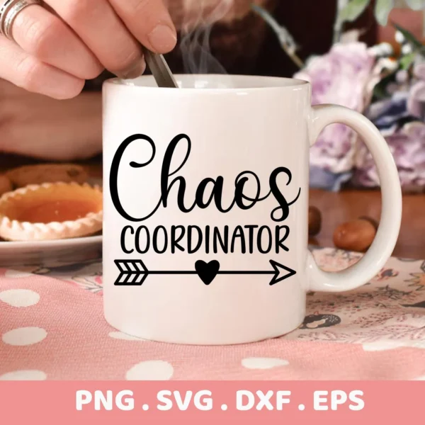 Close-up of a white mug with the text "Chaos Coordinator" and an arrow with a heart, representing a Chaos Coordinator SVG design, available as a digital download bundle (SVG, PNG).
