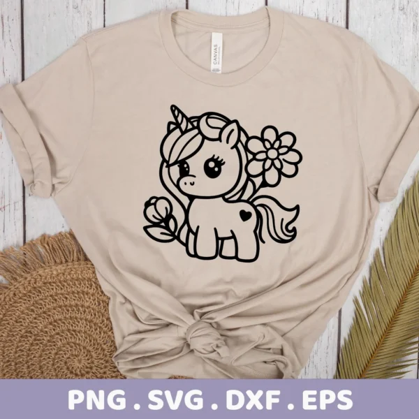 A beige t-shirt displays a black line art design of a cute unicorn with flowers, representing a digital download bundle including SVG and PNG files.