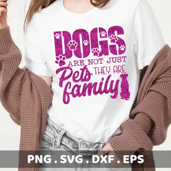 A woman wearing a white t-shirt with a glittery pink "Dogs are not just pets, they are family" design, showcasing a Dogs Family SVG Cricut Design digital download bundle (SVG, PNG).