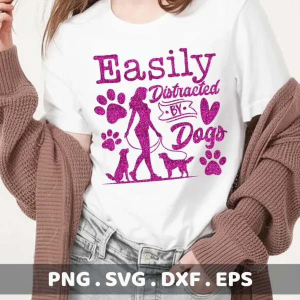 A white t-shirt with a glittery purple design that reads "Easily Distracted By Dogs" with paw prints, a woman walking two dogs, and heart accents; a Distracted Dogs SVG Cricut Design digital download bundle (SVG, PNG).