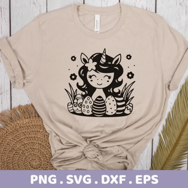 A beige t-shirt displays a black and white cartoon-style Easter unicorn design surrounded by decorated eggs and flowers; this is a digital download bundle including SVG and PNG files.
