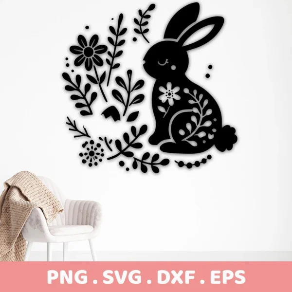 A black silhouette of a floral bunny SVG Cricut design, surrounded by floral elements, shown as a digital download bundle (SVG, PNG).