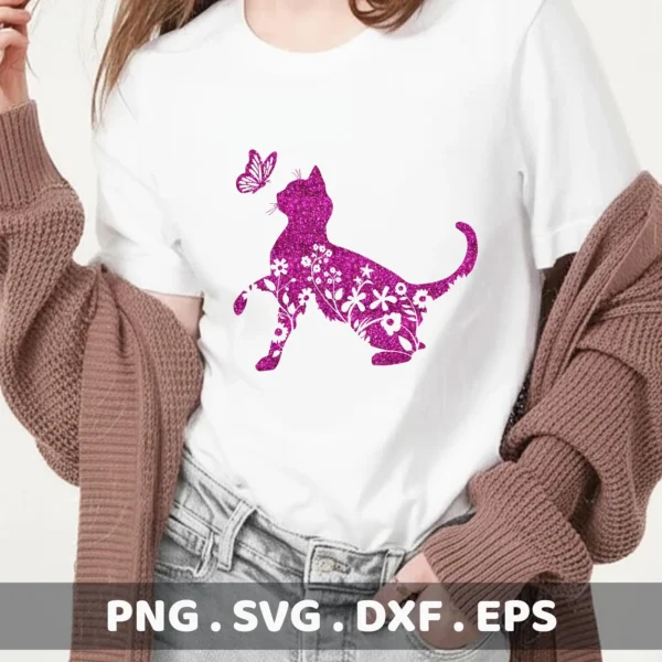 A white t-shirt displays a glittery purple floral cat silhouette SVG design with a butterfly, part of a digital download bundle including PNG, DXF, and EPS formats.