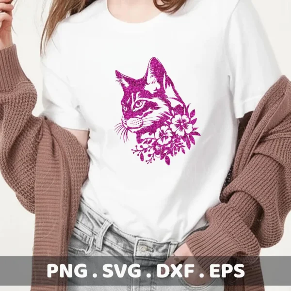 A white t-shirt displays a glittery pink floral cat SVG Cricut design, available as a digital download bundle including SVG and PNG formats.