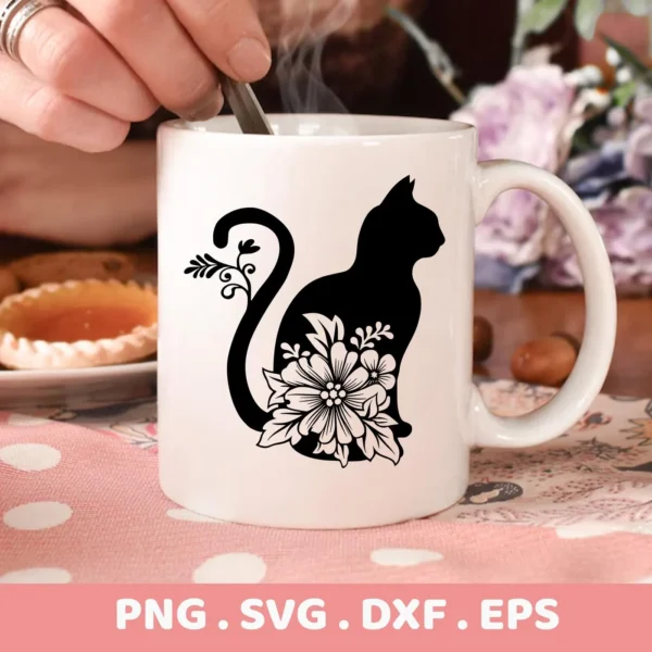 Close-up of a white mug featuring a black floral cat silhouette design, representing a digital download bundle (SVG, PNG).