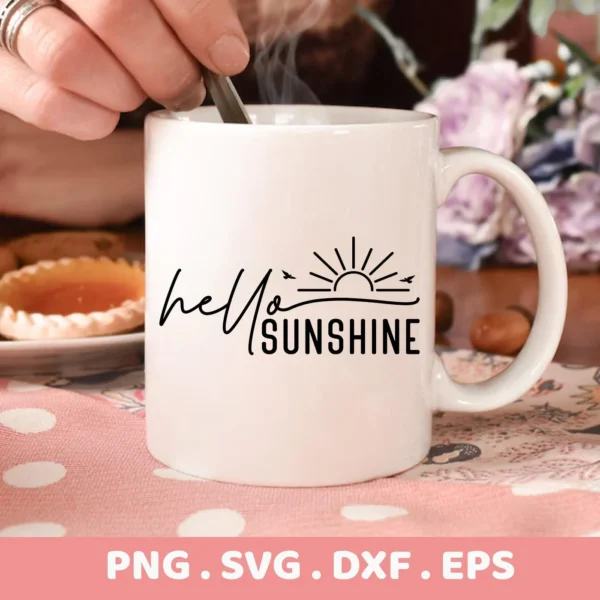 Close-up of a white mug with the design "Hello Sunshine" featuring birds and a sun graphic, showcasing a Hello Sunshine Birds SVG digital download bundle (SVG, PNG).
