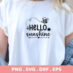 Close-up of a white t-shirt featuring a "Hello Sunshine" design with a bee and sun graphic, representing a Hello Sunshine Bee SVG digital download bundle (SVG, PNG).