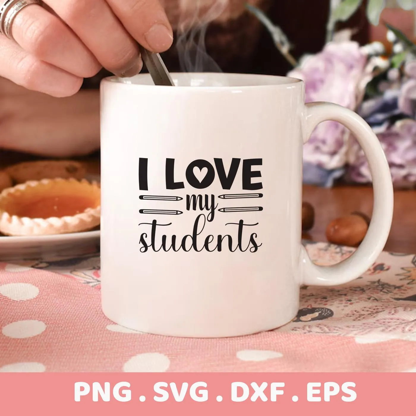 A white mug displaying the "Love My Students SVG" design, shown as a digital download bundle for crafting projects.