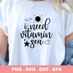 Close-up of a white t-shirt with the black text "I need vitamin sea" above a starfish and cloud graphic, representing a Starfish SVG Beach Decor digital download bundle (SVG, PNG).