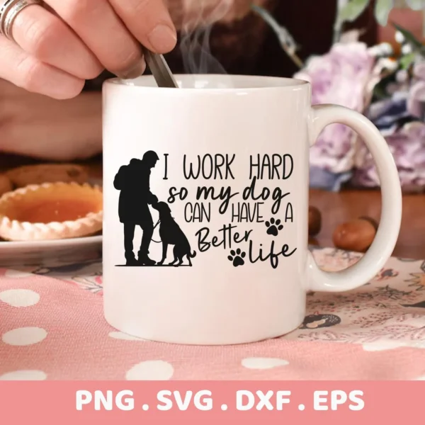 A white mug with the design "I work hard so my dog can have a better life" featuring a silhouette of a person with a dog, representing a Dog Better Life SVG digital download bundle (SVG, PNG).