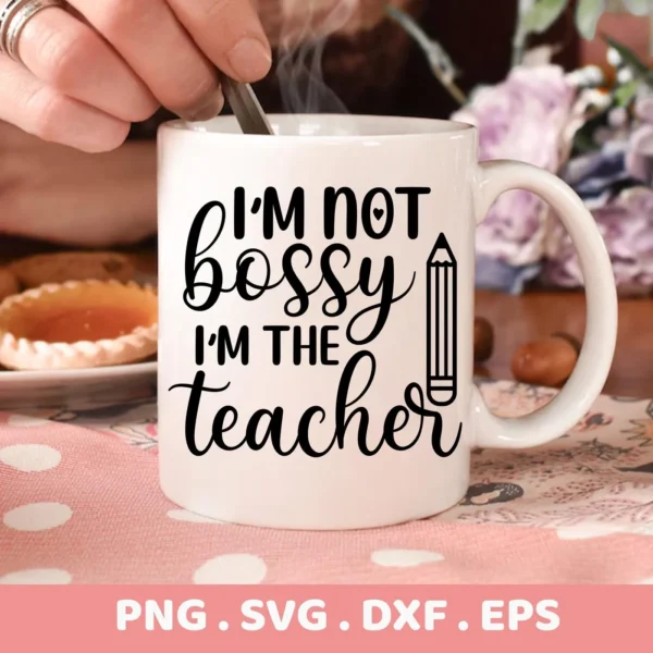 Close-up of a white mug with the text "I'm Not Bossy I'm The Teacher" and a pencil graphic, representing a Teacher SVG Design Cricut digital download bundle (SVG, PNG).