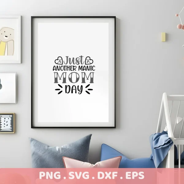 A framed print reading "Just Another Manic Mom Day" hangs on a wall in a nursery setting, showcasing a digital download bundle (SVG, PNG) for **manic mom day**.
