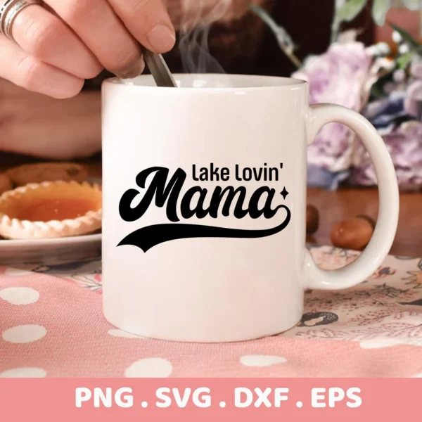 Close-up of a white mug with the text "Lake Lovin' Mama" in a stylized font, part of a digital download bundle (SVG, PNG).