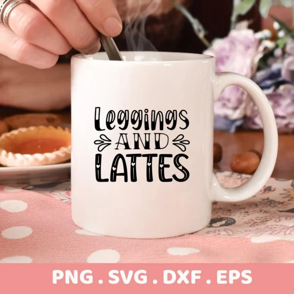 A white mug with the text "Leggings and Lattes" is being stirred, showcasing a digital download bundle (SVG, PNG) for crafting.