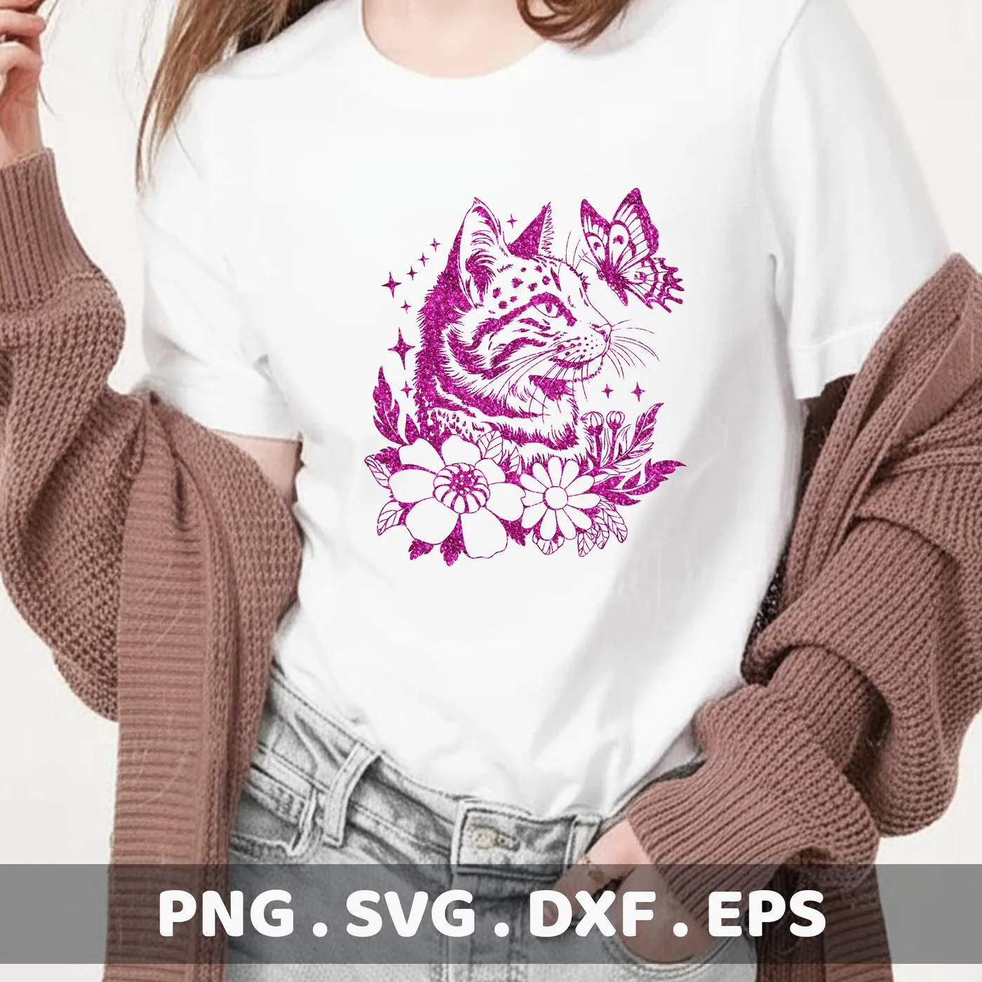 A white t-shirt displays a floral cat SVG design in pink, featuring a stylized cat head with a butterfly and flowers, indicating a digital download bundle (SVG, PNG).