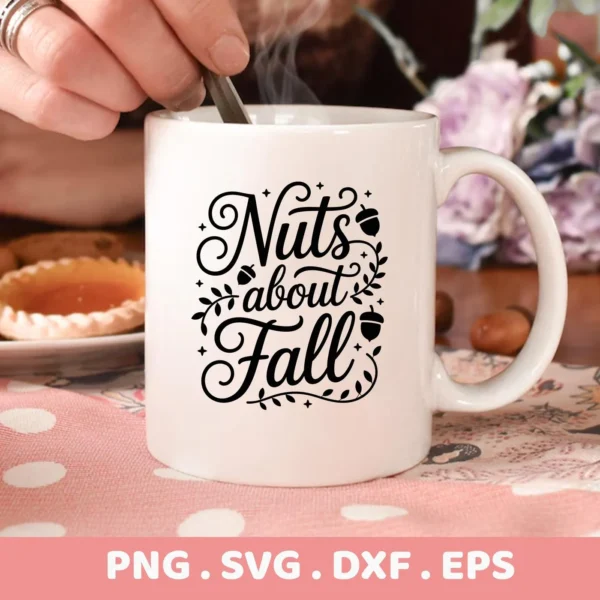 Close-up of a white mug featuring a "Nuts About Fall" design with acorns and foliage, intended for Cricut cutting and serigraphy applications.