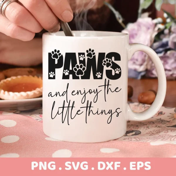 Close-up of a white mug with the text "Paws and enjoy the little things" in black, featuring paw prints within the word "Paws," representing a Paws SVG Enjoy Little Things digital download bundle (SVG, PNG).
