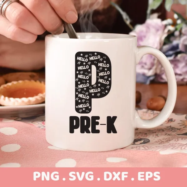 Close-up of a white mug with a black "P" filled with "Hello" and stars, and "PRE-K" below, representing a Pre-K SVG design for Cricut, available as a digital download bundle (SVG, PNG).