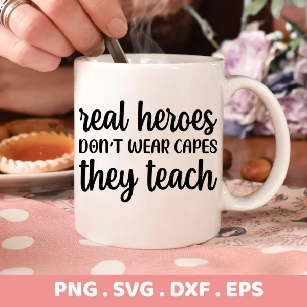 Close-up of a white mug with the text "real heroes DON'T WEAR CAPES they teach," representing a Teacher Hero SVG Design available as a digital download bundle (SVG, PNG).