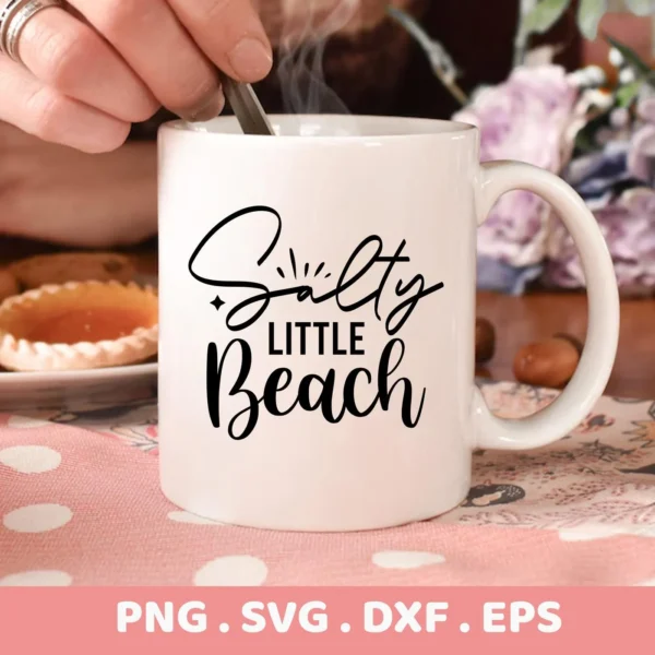 Close-up of a white mug with the text "Salty Little Beach" in black script, part of a digital download bundle (SVG, PNG).