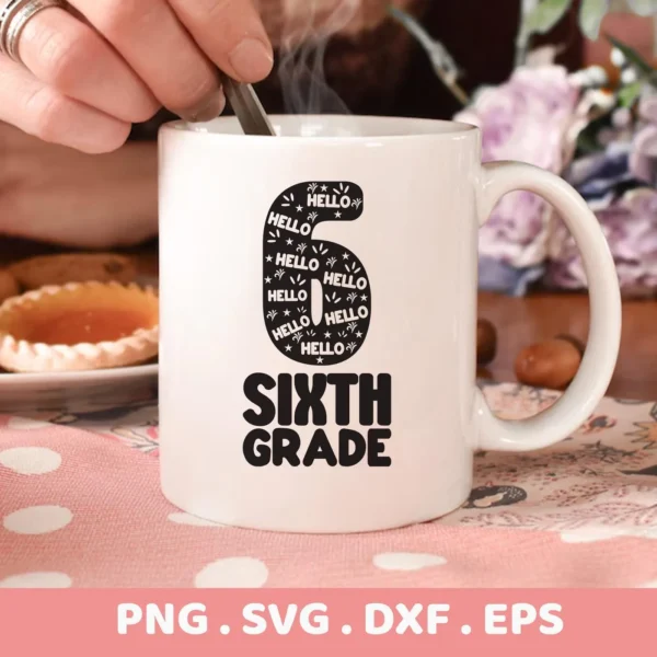 Close-up of a white mug with a "Sixth Grade SVG Design" featuring the number "6" filled with "Hello" and stars, and the words "Sixth Grade" below, representing a digital download bundle (SVG, PNG).
