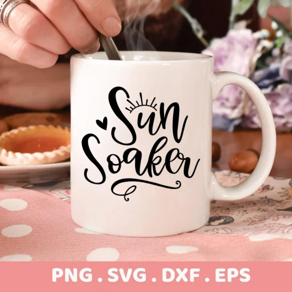Close-up of a white mug with the "Sun Soaker" SVG design, part of a digital download bundle including SVG and PNG formats.
