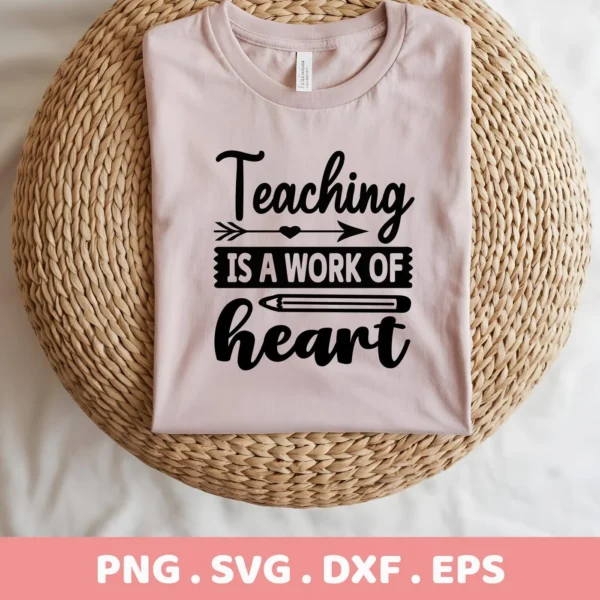 A light pink t-shirt with the "Teaching is a work of heart" quote design in black, displayed on a woven mat, showcasing a digital download bundle (SVG, PNG) for crafting.