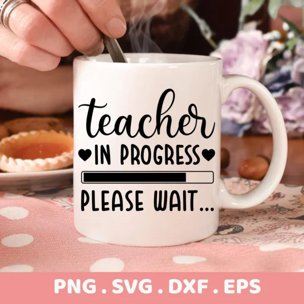 Close-up of a white mug with the text "Teacher In Progress, Please Wait..." and a loading bar design, representing a digital download bundle including SVG and PNG files.