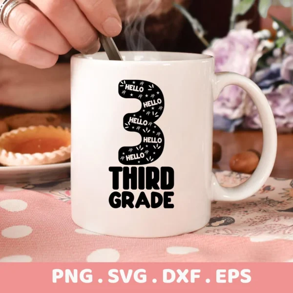 Close-up of a white mug featuring a "Third Grade SVG Design" with the number "3" filled with "Hello" and stars, and the words "Third Grade" below, indicating a digital download bundle (SVG, PNG).